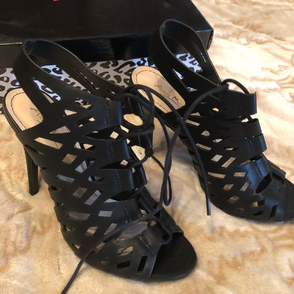 Black never worn heels